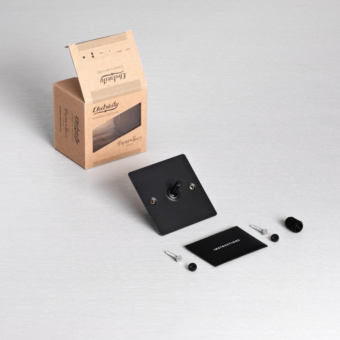 Interrupteur à bascule intermédiaire Buster + Punch 1G noir