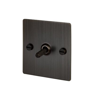 Interrupteur à bascule intermédiaire Buster + Punch 1G, bronze fumé