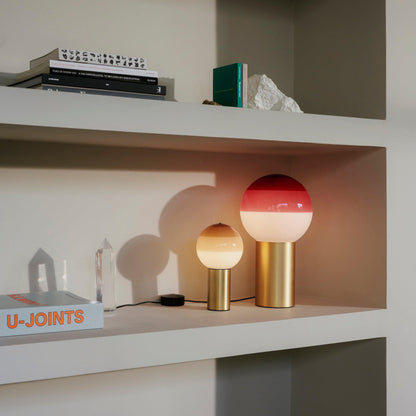 Lampe de table Marset à éclairage plongeant