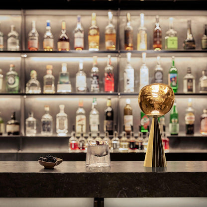 Lampe de table portable Tom Dixon Melt dorée